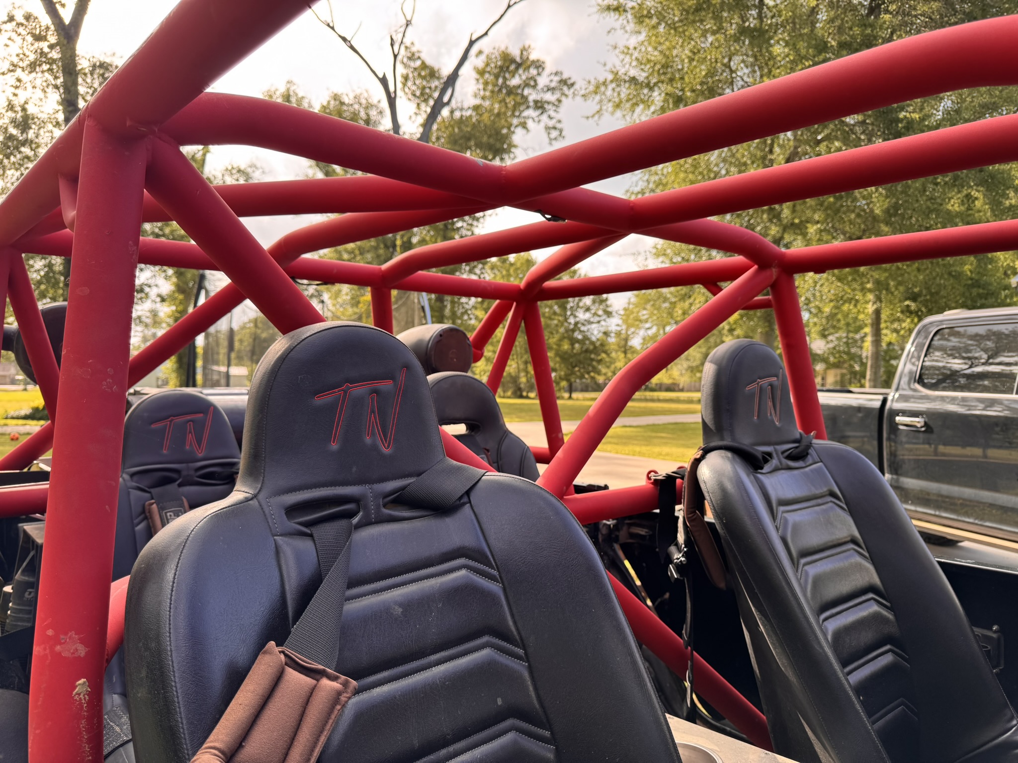 PRP seats and harnesses inside the modified red cage