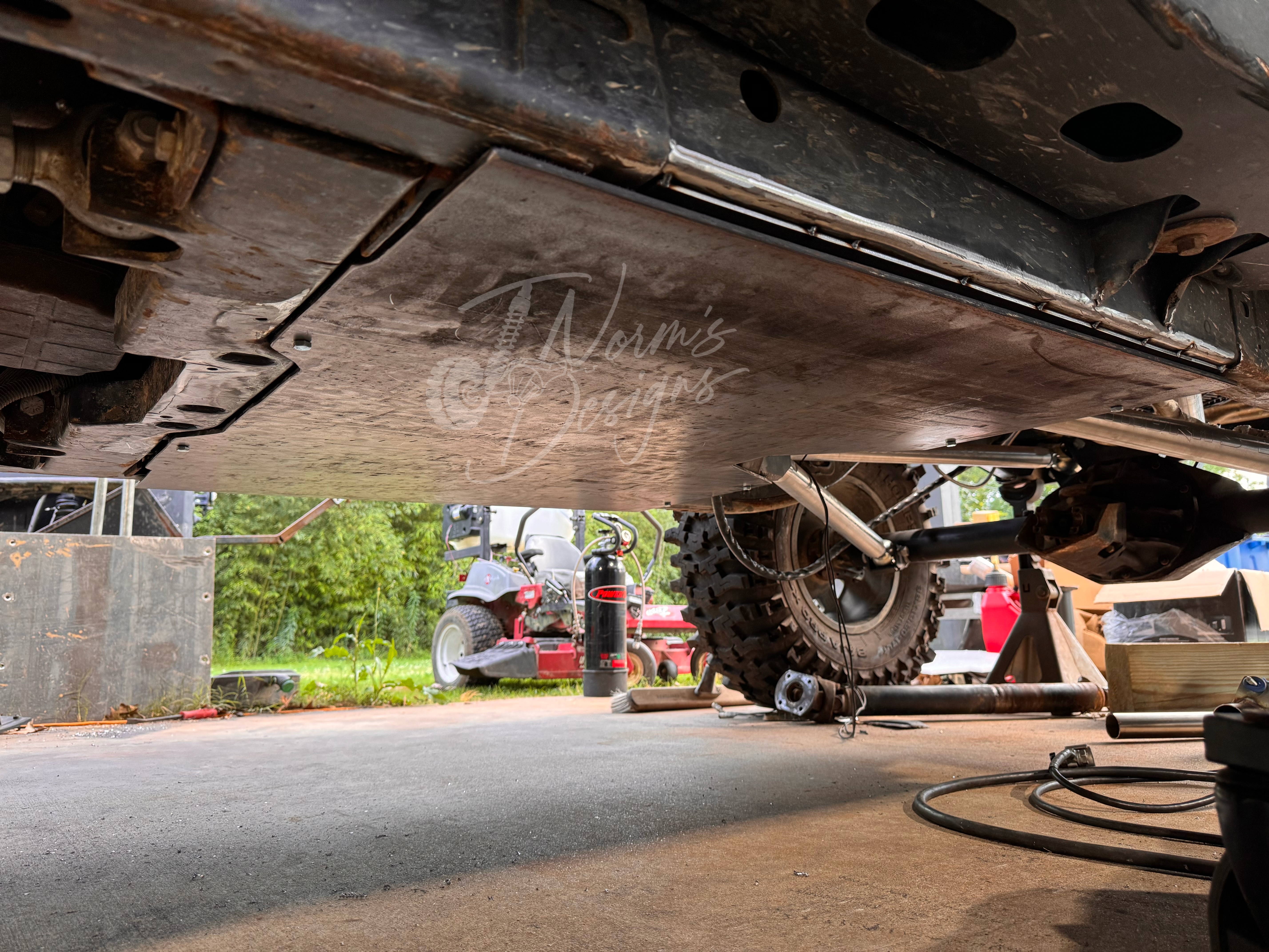 Fabricated underbody skid plate with TNorm’s Designs watermark