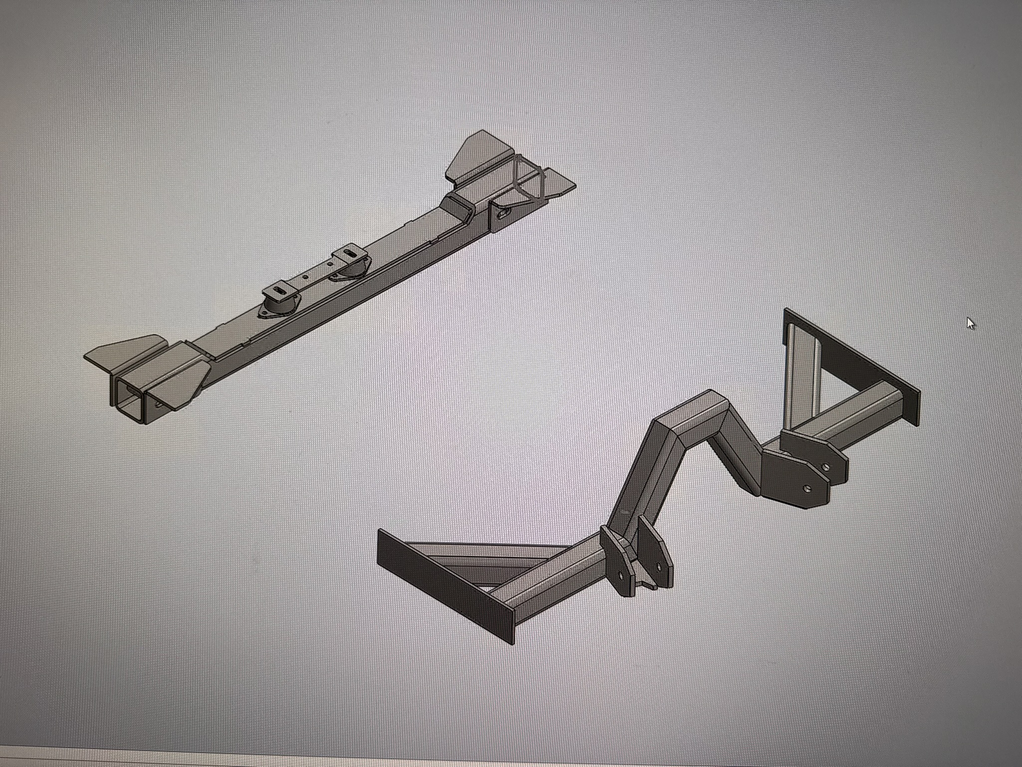 CAD view of custom suspension mounting components